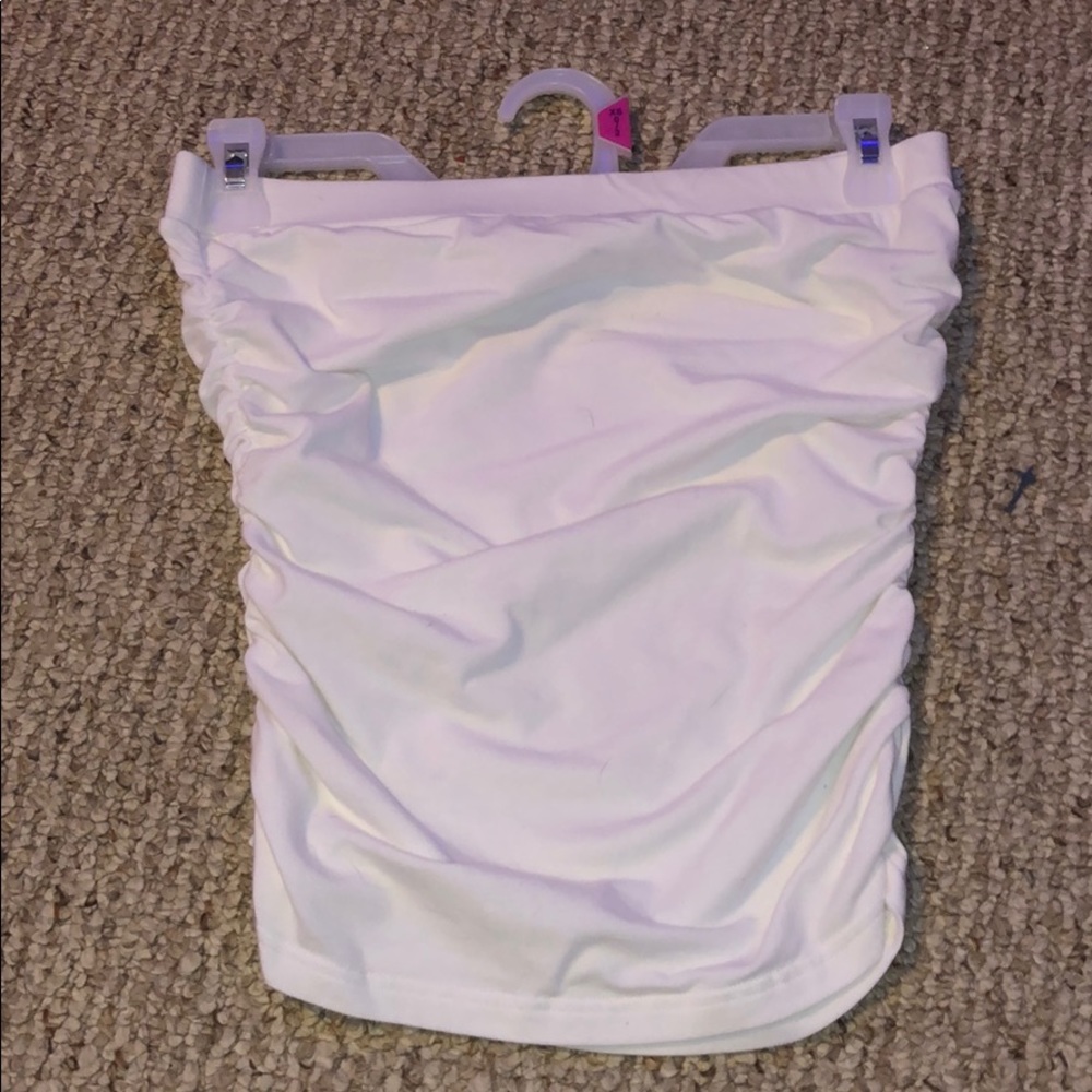 White sleeveless top